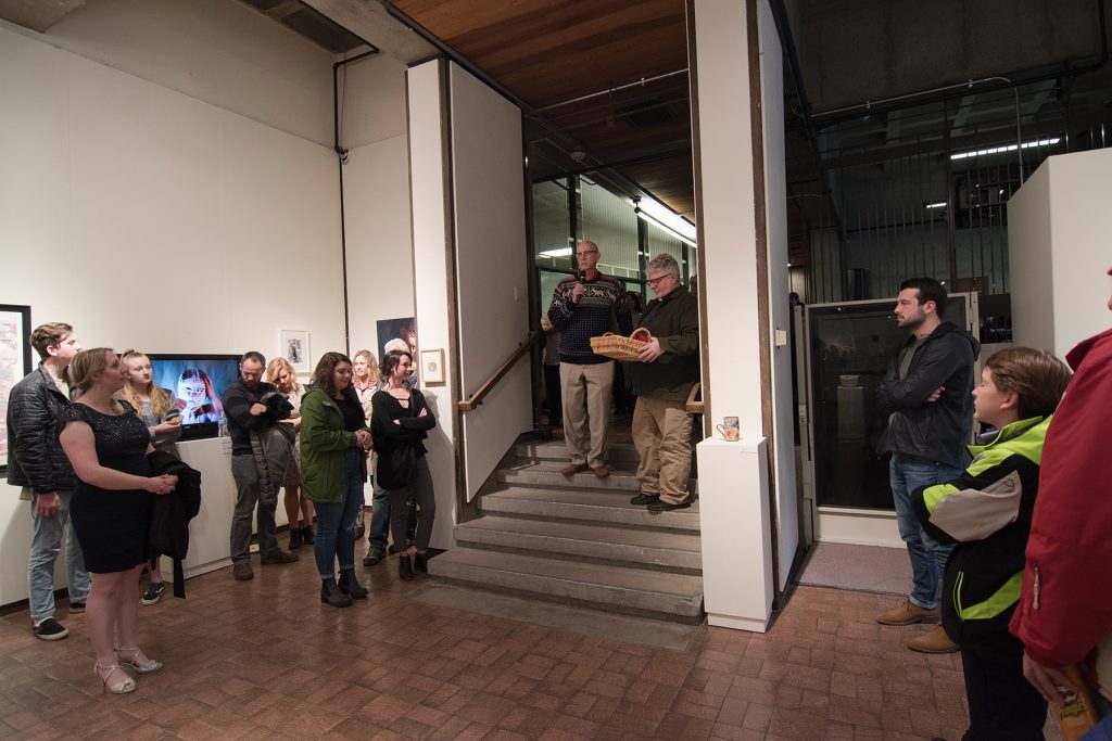 Annual Student Exhibition, 2018: Opening Reception; Whit Hollis, director of the A. Ray Olpin Student Union, announced the Union purchase award winner Leah Caldwell