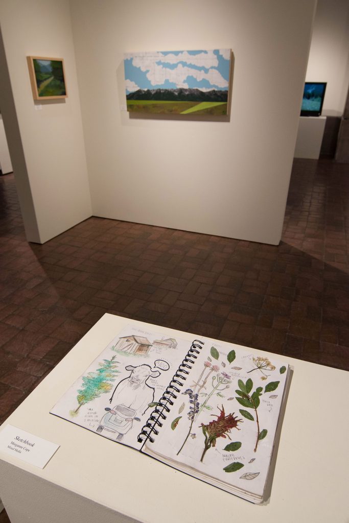 Open Sky: Taft-Nicholson Residency Exhibition, Gittins Gallery, September 2017; artwork: sketchbook: Morganne Cope, background paintings: Victoria Attwood (left), Sarah Peterson (right)